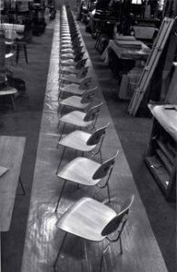 Antique Furniture - Factory Line Of Chairs