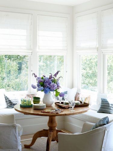 sustainable-furniture-a-bright-and-sunny-dining-nook-with-antique-table