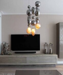 Glass pendant lights- seen in a living room- Styylish