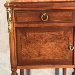 Antique nightstands- detail of the doors with burl wood veneer of one piece- styylish