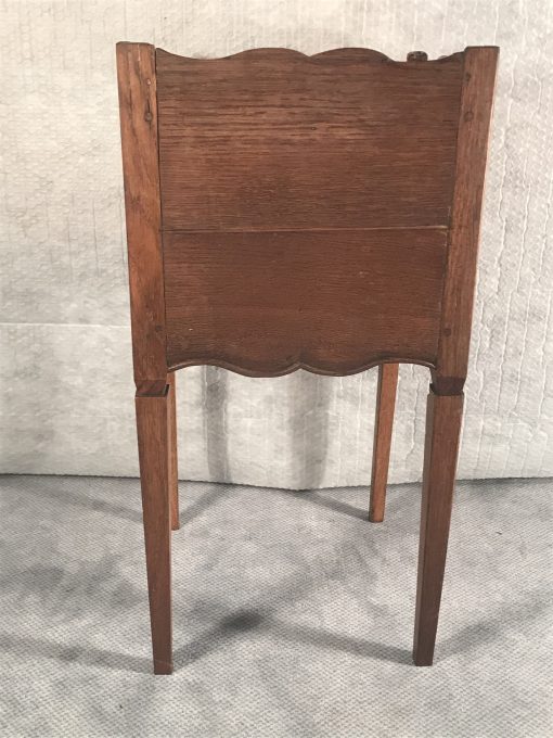 Two provincial nightstands- smaller table- back view- styylish