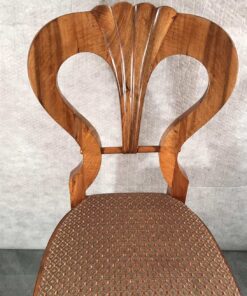 Six Biedermeier walnut chairs- one chair detail of the backrest- styylish