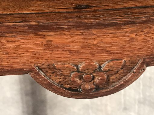 Two provincial nightstands- one of the two- detail of carved decoration- styylish