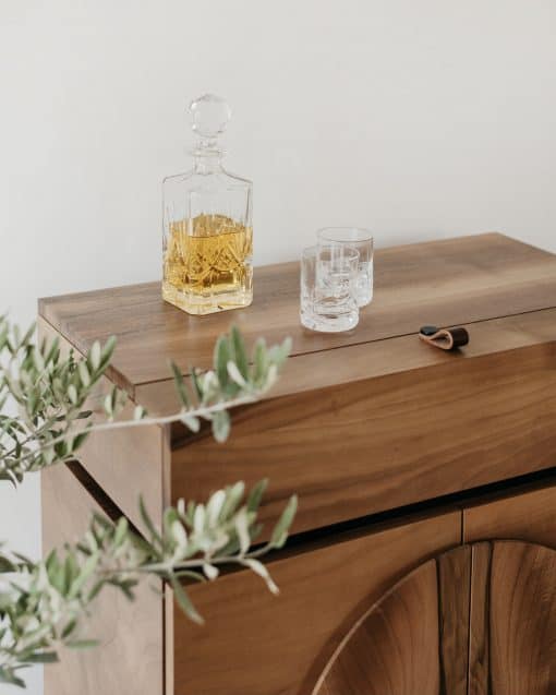 Custom made bar cabinet- detail of the closed top with glasses- styylish