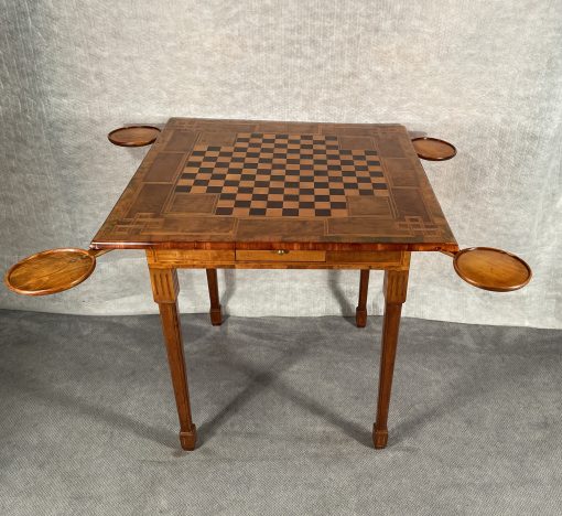 Louis XVI card table- view of the table with little trays for cards or chips- styylish