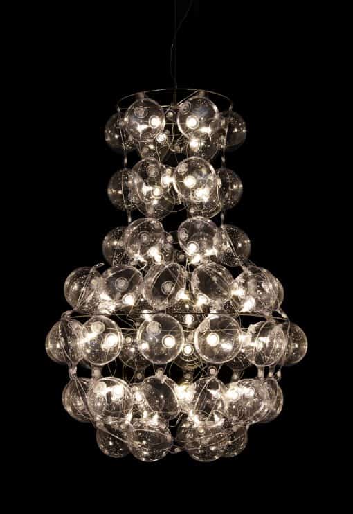 Recycled Chandelier- model Prince on the black background- Styylish