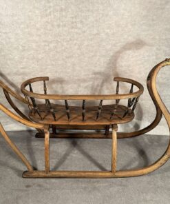 Antique sled- side view of the sled with back of the seat- Styylish