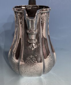 Silver coffee and tea set- detail of the cream pot- Styylish