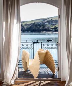 Walnut Monroe Chair-shown in the front of the sea- Styylish