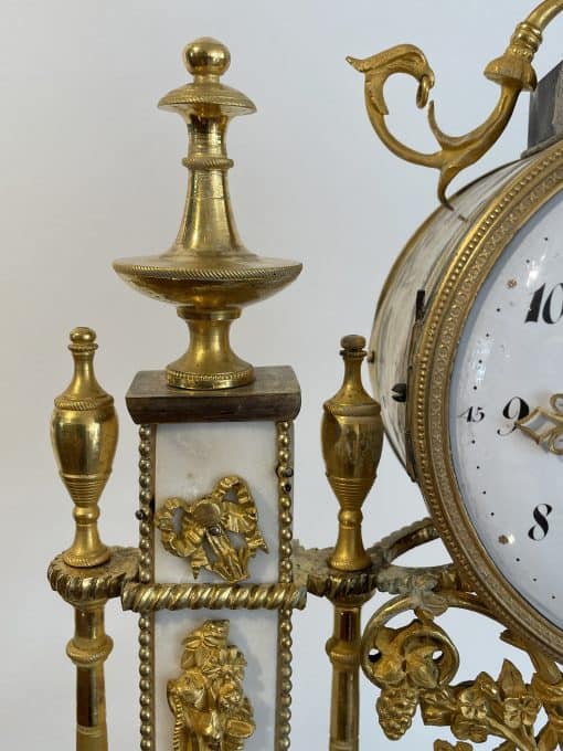 Louis XVI Mantel Clock- detail of the ormolu and marble- Styylish