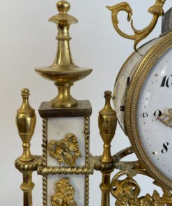 Louis XVI Mantel Clock- detail of the ormolu and marble- Styylish