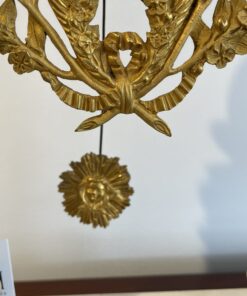 Louis XVI Mantel Clock- detail with the sunburst pendulum- Styylish