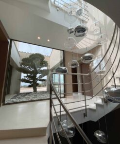 Pebble Suspension Lamp- hanging in a staircase- Styylish