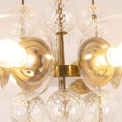 Brass and Glass Chandelier - Light Detail - Styylish