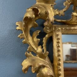 Hand-Carved Gilt Wood Mirror- detail of the upper left side- Styylish