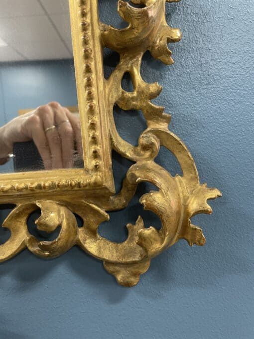 Hand-Carved Gilt Wood Mirror- detail of the lower right- Styylish