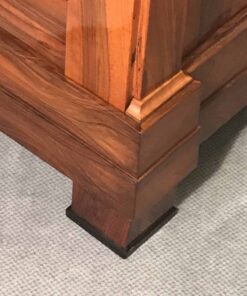 Biedermeier walnut armoire- corner view with foot- Styylish