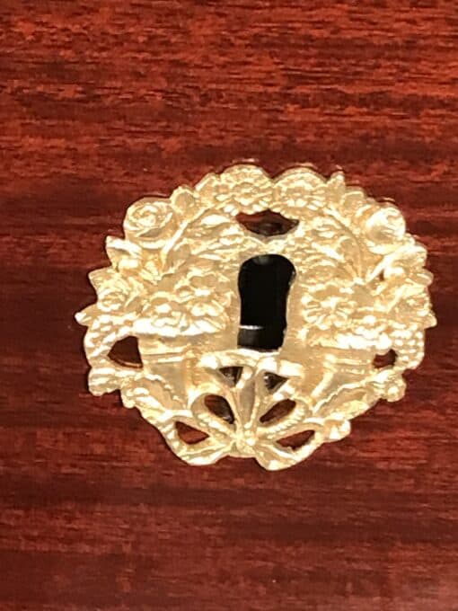 French Empire Dresser- detail of escutcheon- Styylish