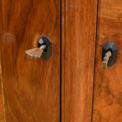 Burl Walnut Mirrored Cabinet- detail of escutcheons- Styylish