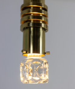 Maison Raak Cylindrical Light Fixtures - Bulb and Frame Detail Light On - Styylish